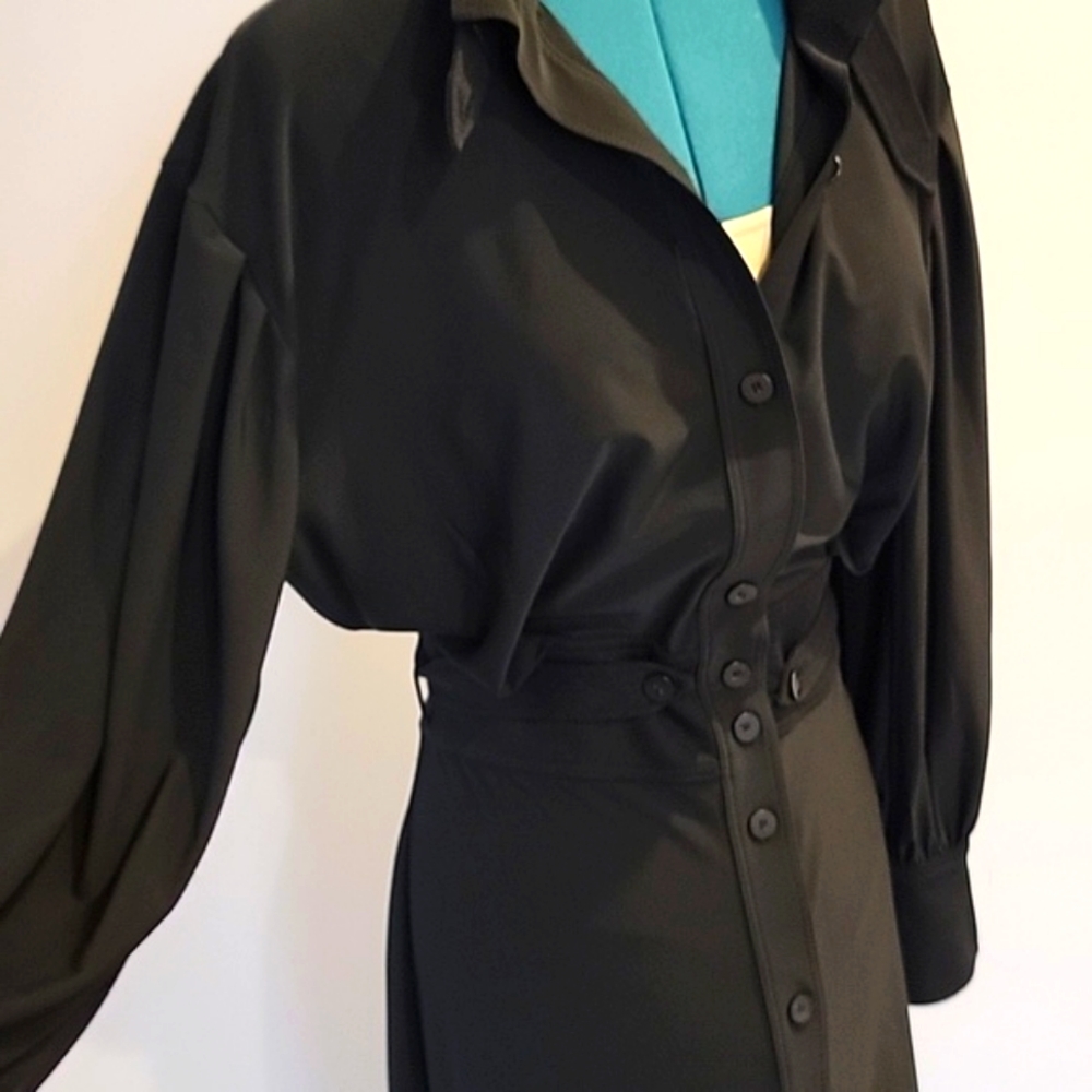 Zara  Black Long sleeve button down dress with split sleeves.